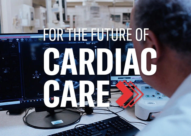 For the Future of Cardiac Care Graphic with Doctor viewing computer monitor